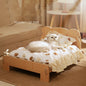 Wooden bed with teddy bear pattern – coziness in a natural look